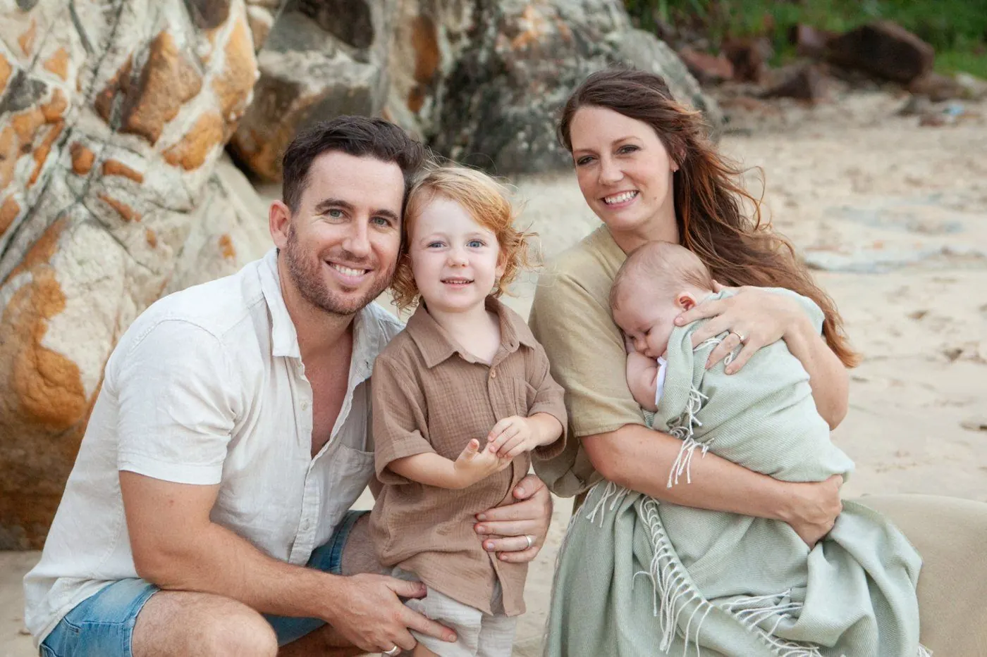 Kale Kneale with his wife and two young children